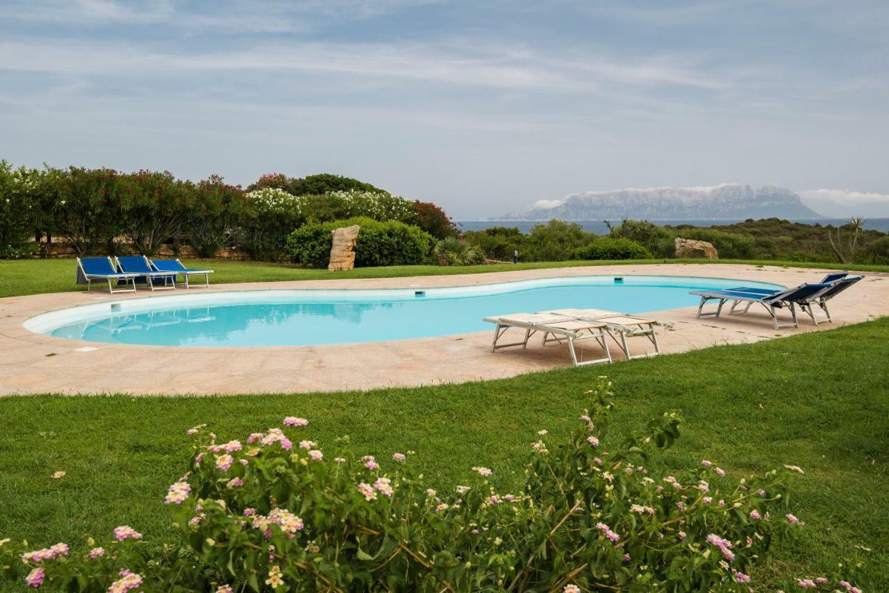 Spiaggia Bianca Pedra Rosa Golfo Aranci Bagian luar foto